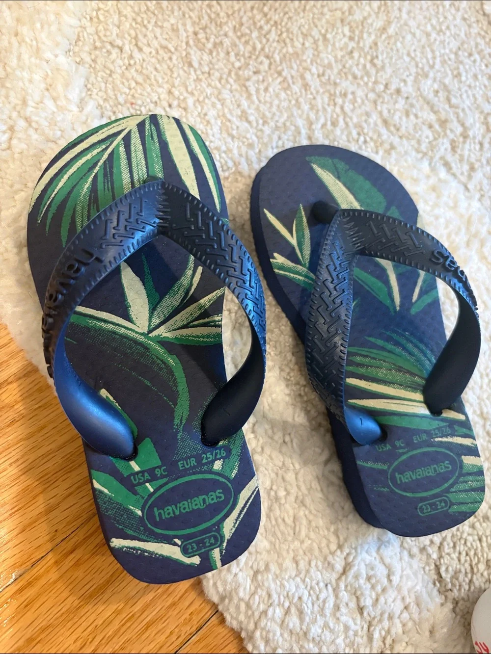 Havaianas Navy Flip Flops with Green Leaf Design